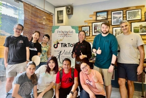 Aula de culinária imersiva e visita ao mercado com um chef local + livro de receitas