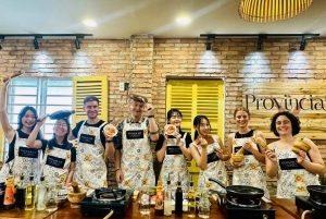 Aula de culinária imersiva e visita ao mercado com um chef local + livro de receitas