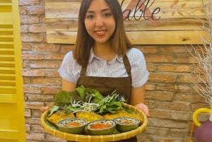 Aula de culinária imersiva e passeio pelo mercado de BenThanh com um chef local