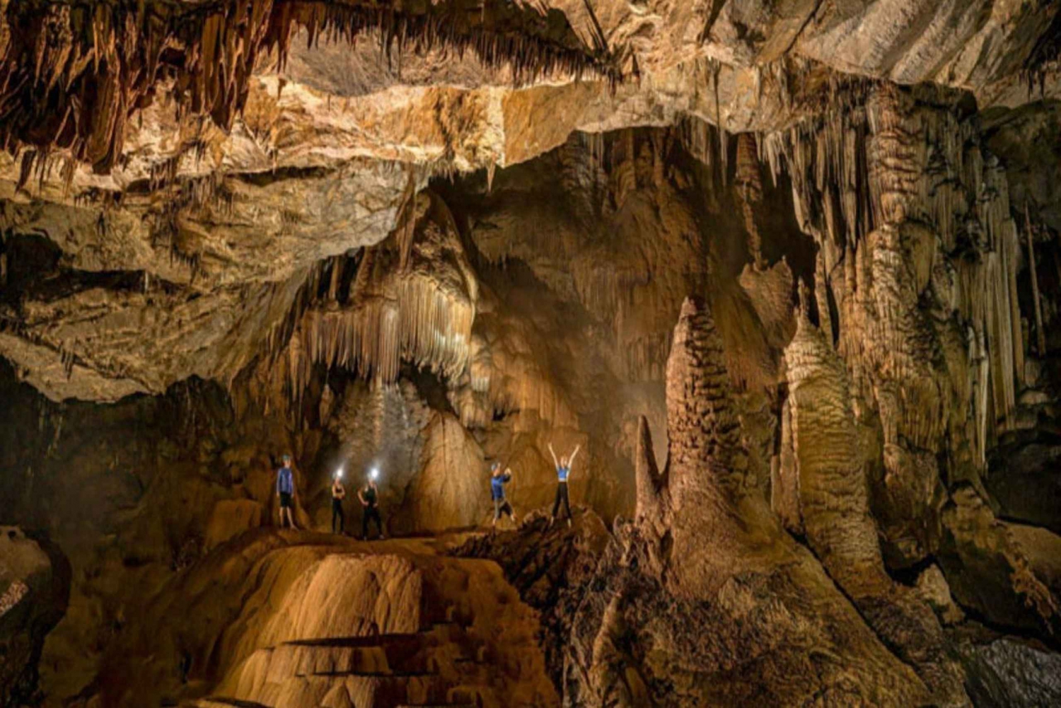 Paradise Cave and Dark Cave 1 Day Trip and Discover Zipline