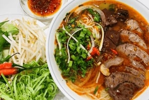 Saigon: Michelin Guide Food Tour with Ao Dai Female Riders