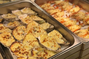 Saigon Night Tour: Street Food, Water Bus, Skyline Coffee