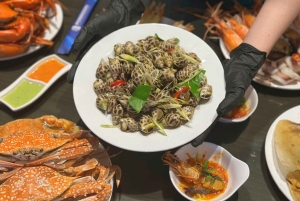 Saigon Night Tour: Street Food, Water Bus, Skyline Coffee