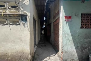 Saigon Slum Tour with Motorbike