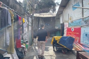 Saigon Slum Tour with Motorbike
