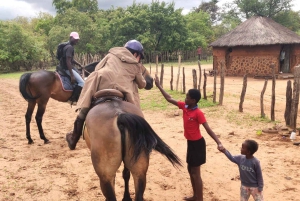 Victoria Falls: African Village Community Tour on Horseback