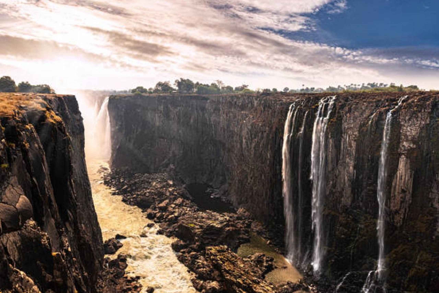 Victoria Falls: guidet tur, bydelbesøk og solnedgangscruise