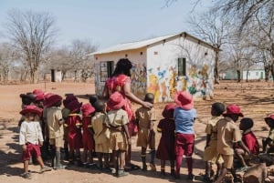 Victoria Falls: Landsbyopplevelse med luksuscruise og lunsj